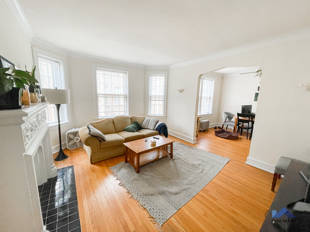 a living room with a couch and a coffee table